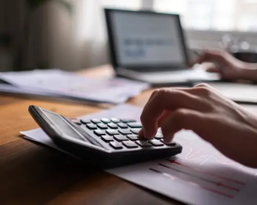 Patient paying for dental care with a card at the front desk