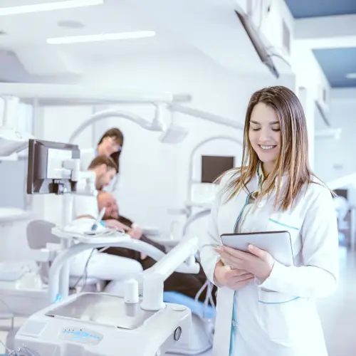 Dentist checking a patient’s teeth during a comprehensive exam