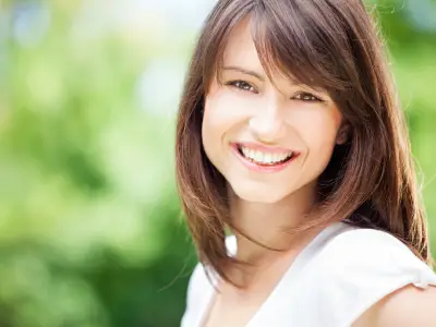 Smiling patient after cosmetic dental treatment
